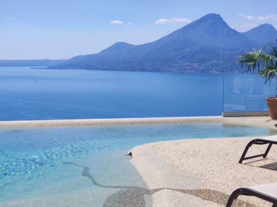 Villa Divina-Apt Armonia-Con Piscina E Vista Lago 카스텔레토디브렌조네 외부 사진